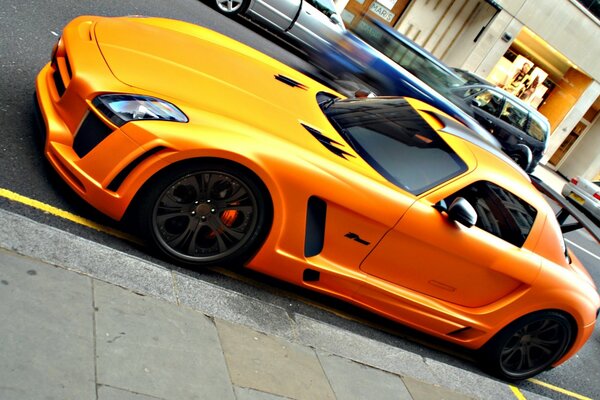 Parked Orange Tuned Mercedes