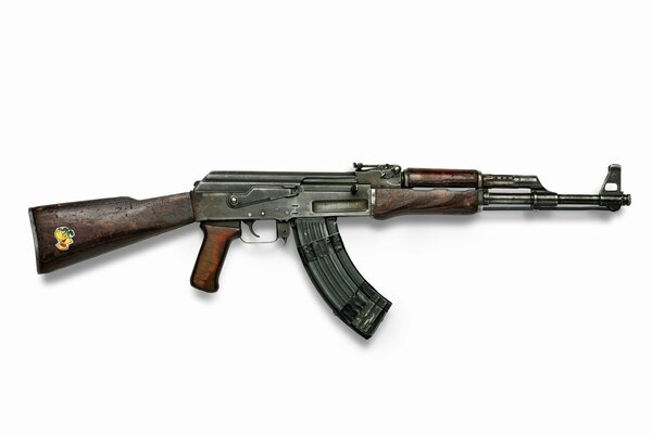 Broń AK-47 z czasów ZSRR z naklejką z kreskówkowym psem