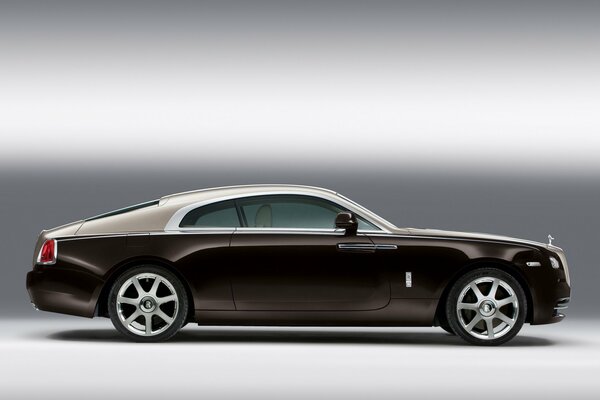 A jealous Rolls Royce on a gray background