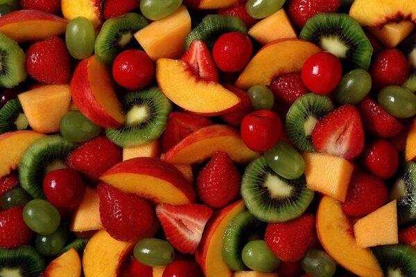 Fruit set of kiwi, strawberries and grapes