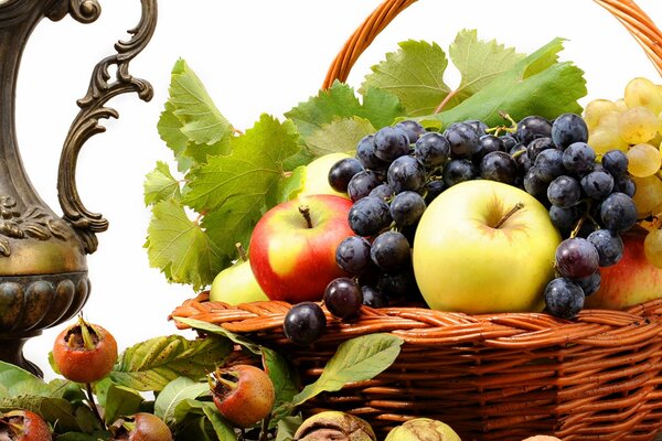 Fruit still life in a basket. Different fruits in the photo