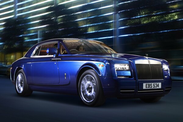 The Rolls-Royce coupe blue car is just a luxury