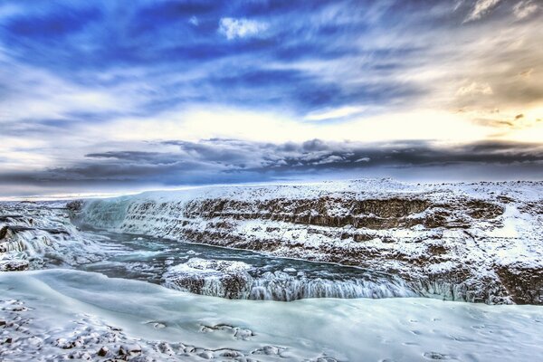 Landscape hdr . snow - covered river