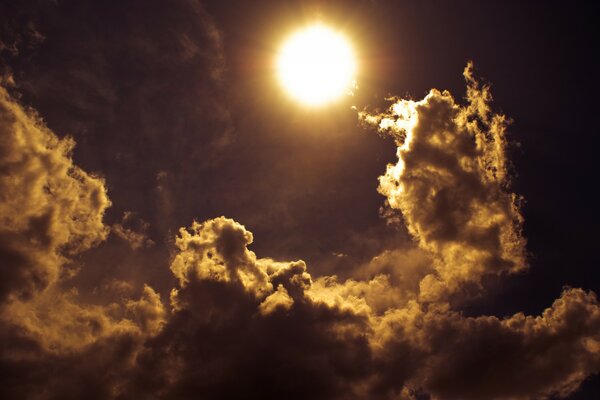 Bright sun and clouds in the sky