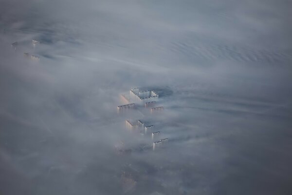 A city covered with heavy fog