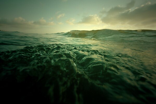 A dark incoming wave in the ocean