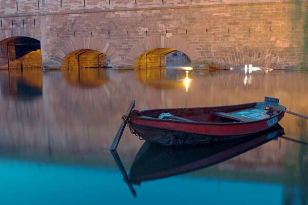 Boat in the evening in Strasbourg at the bridge