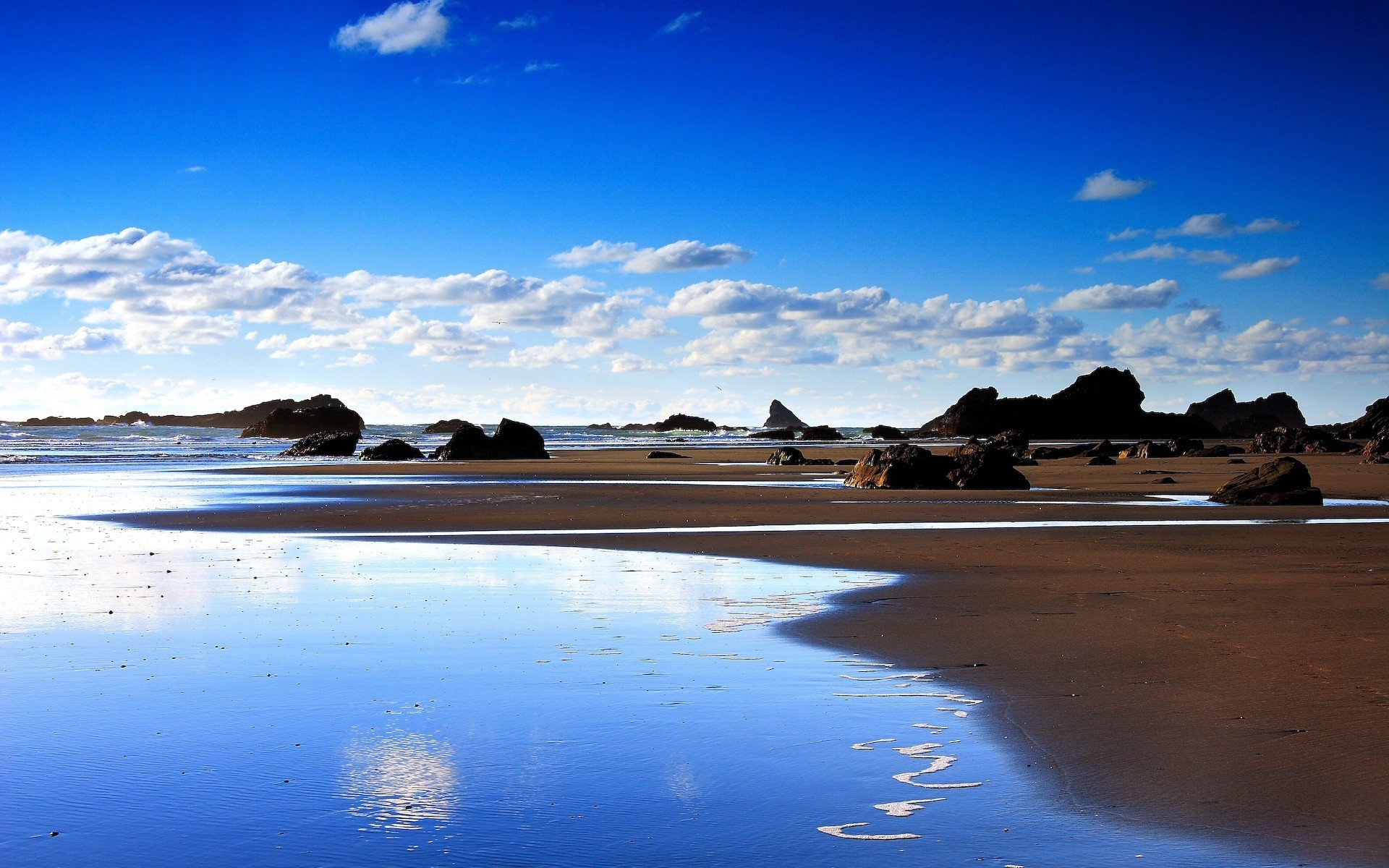 beach tide water stones cloud