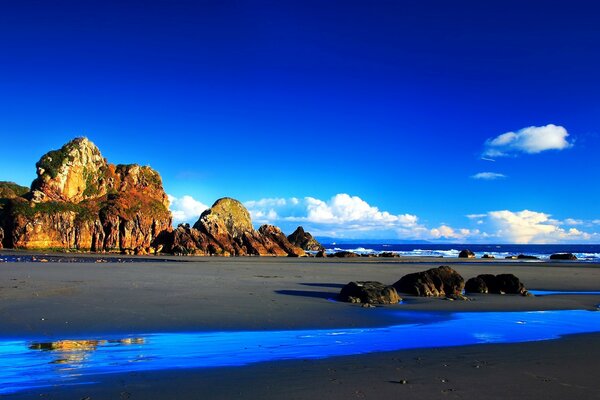 Rocky shore by the blue ocean