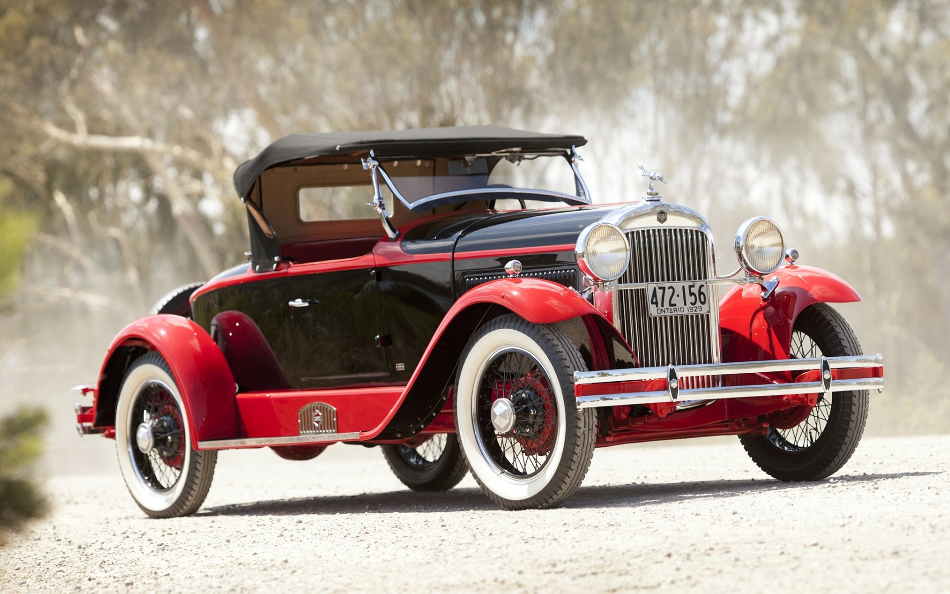 essex speedabout boottail roadster von biddell&smart 1929 front rot retro straße staub hintergrund