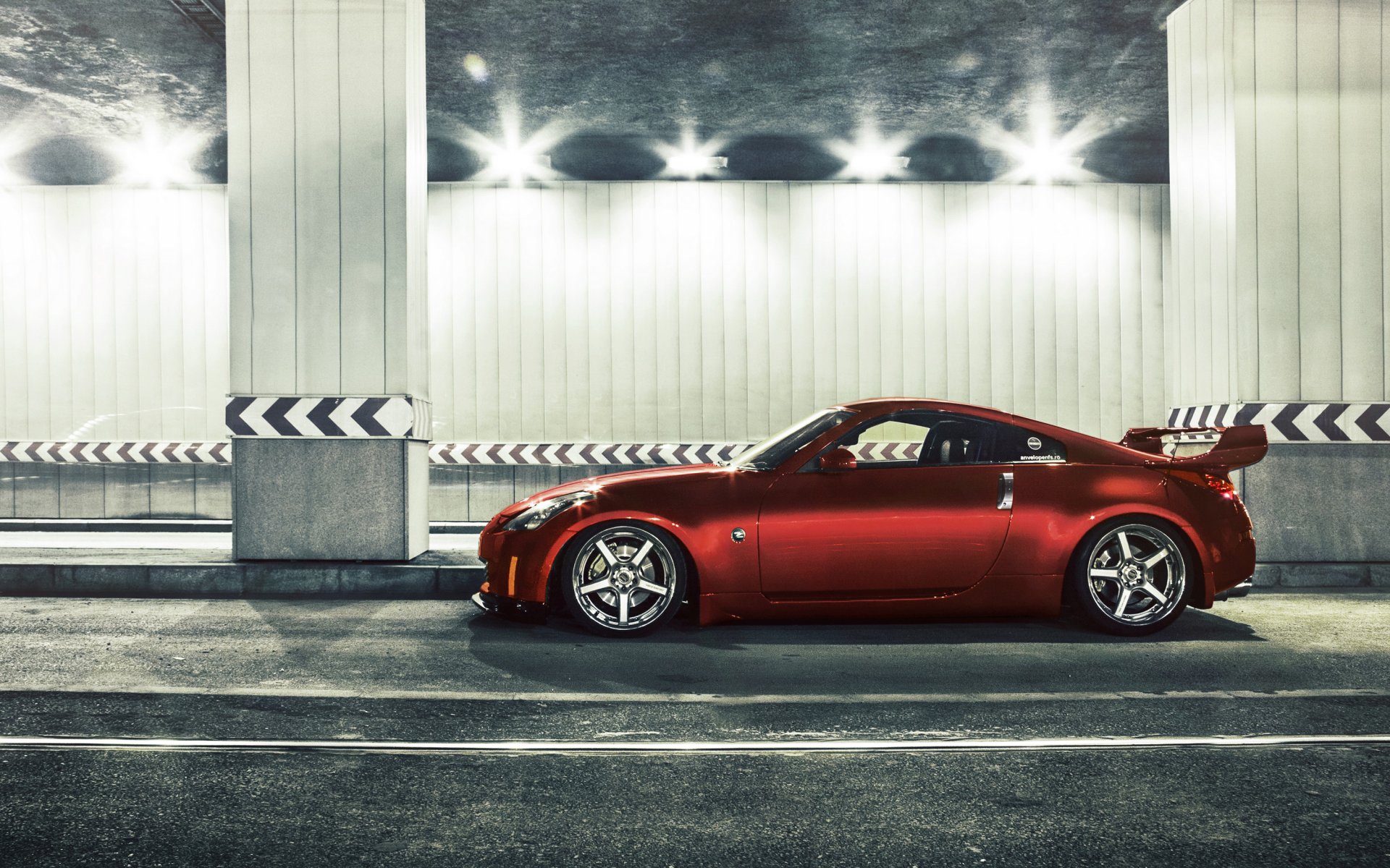 nissan 350z tuning samochód nissan auto czerwony tunel