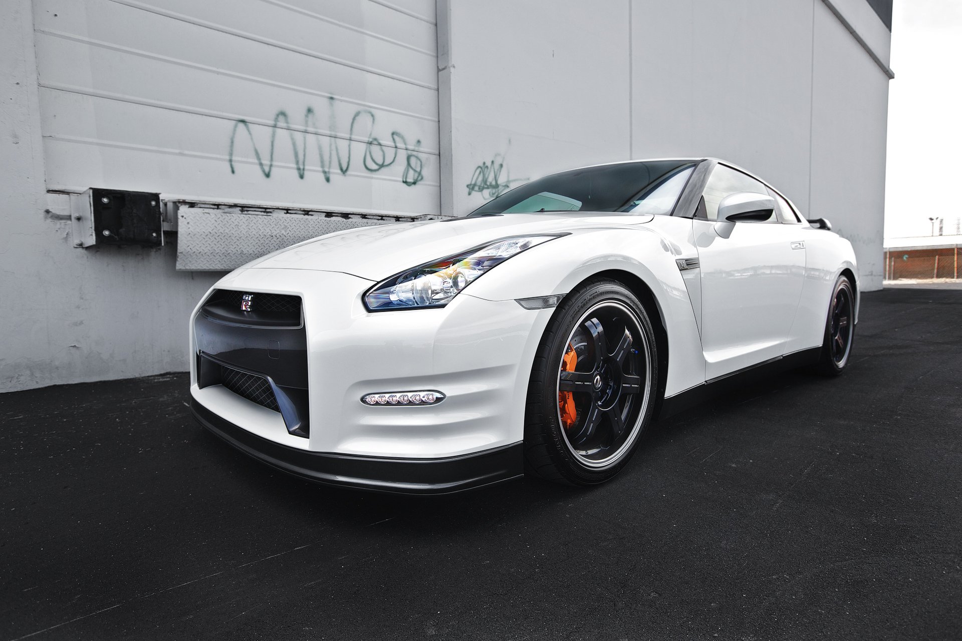 nissan gtr r35 white nissan gtr front reflection asphalt