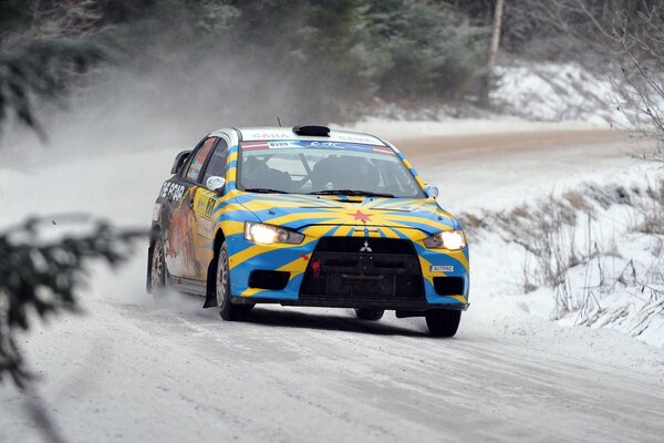 Rally in the snow. On the front of the mitsubishi