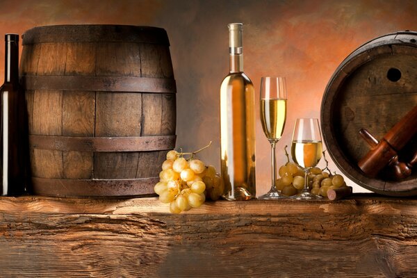 Wine barrels, grape fruits and wine