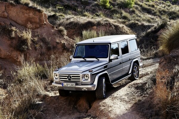 Mercedes-benz g-class car in a mountainous area