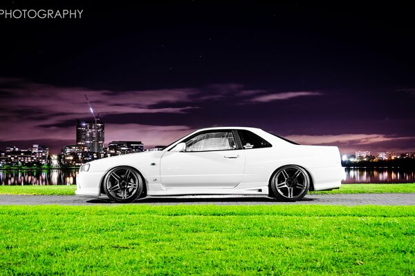 Nissan skyline on the background of the night city