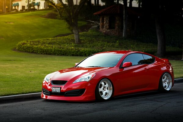 Red hyundai and beautiful landscape