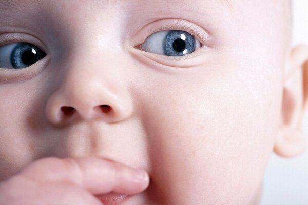 A baby with beautiful blue eyes