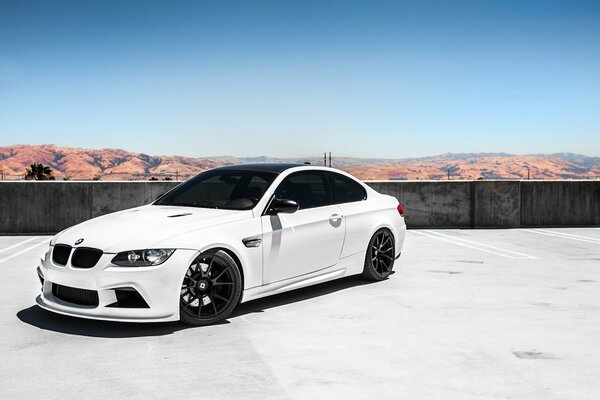 BMV m3 e92 car on the background of a mountain range