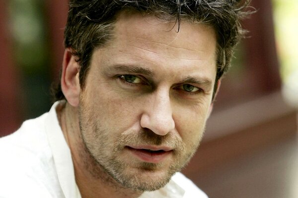 Handsome actor Gerard Butler with a neat stubble