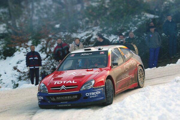 Citroen racing car on a snowy turn