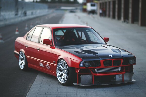 BMW e34 car, tuning, black bumper, road, cones