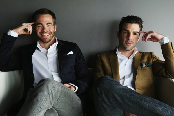 Two handsome American actors Christopher whitelaw and Quinto Zachary John are smiling