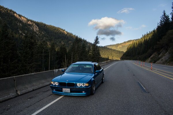 Blue car sky clouds