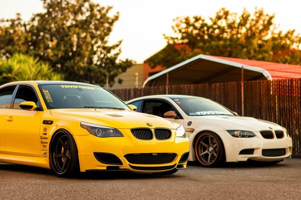 Yellow and white cars in tuning