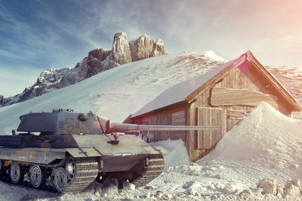 Tanque alemán en un pueblo cubierto de nieve