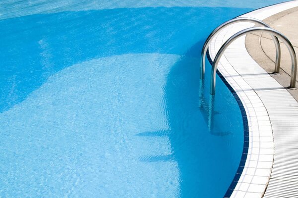 Blue water in a white pool