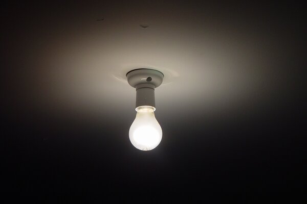 Light from a light bulb on the ceiling