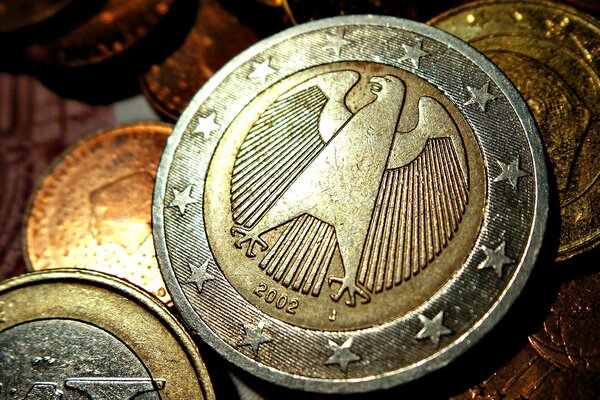 Águila alemana en monedas europeas