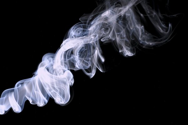 Rising smoke on a black background