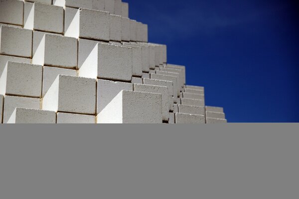 Saul Levitt s sculptural structures on a blue background