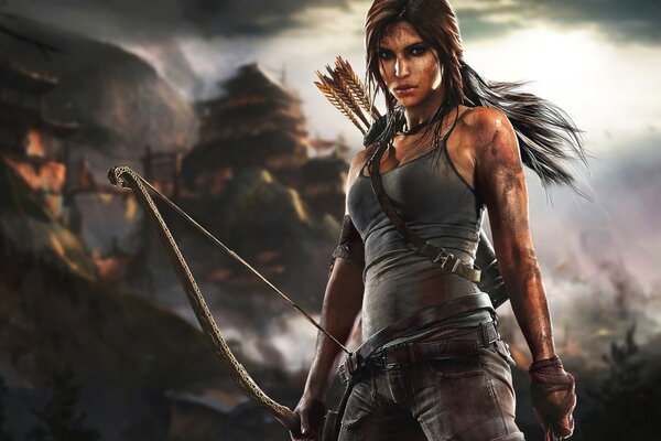 Die neue Lara Croft mit dem Bogen schaut in die Kamera