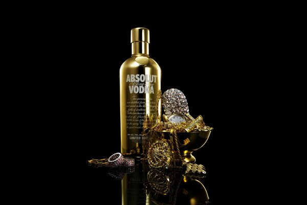Absolut vodka in a golden bottle with jewels
