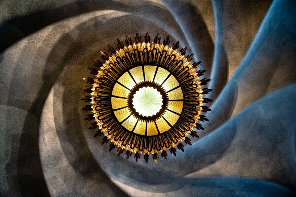 Spiral staircase and luminous chandelier