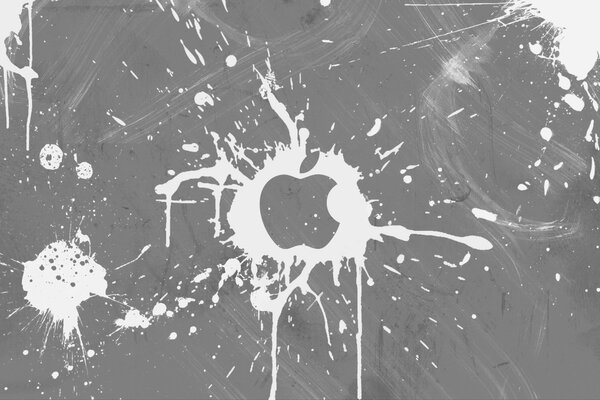 Apfel in weißer Farbe auf grauem Hintergrund