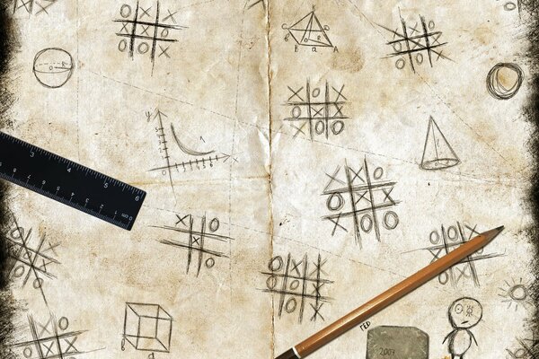 The paper with the image of the game tic-tac-toe, on it are a pencil, a ruler and a grater