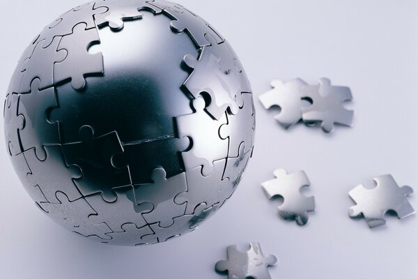 A steel ball plastered with a puzzle