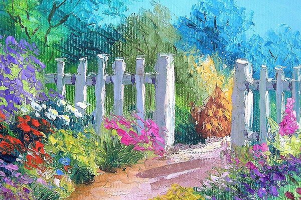 A fence surrounded by greenery and lots of flowers