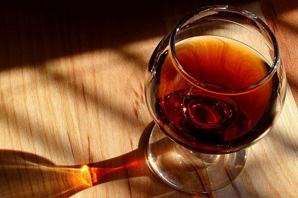 Reflection of a glass filled with cognac