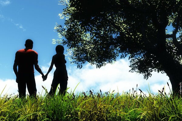 Silhouetten eines Liebespaares in der Natur am Baum