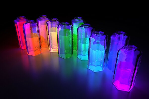 Liquides multicolores dans des bocaux en verre