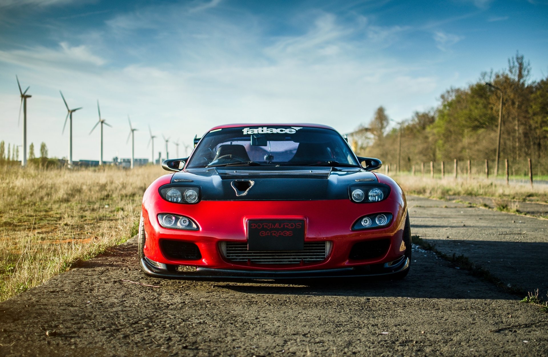 mazda rx-7 rojo mazda rojo frente cielo nubes aerogeneradores