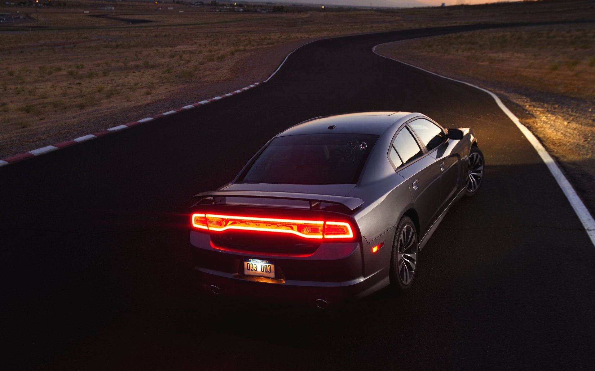 dodge challenger car gray evening headlights light road