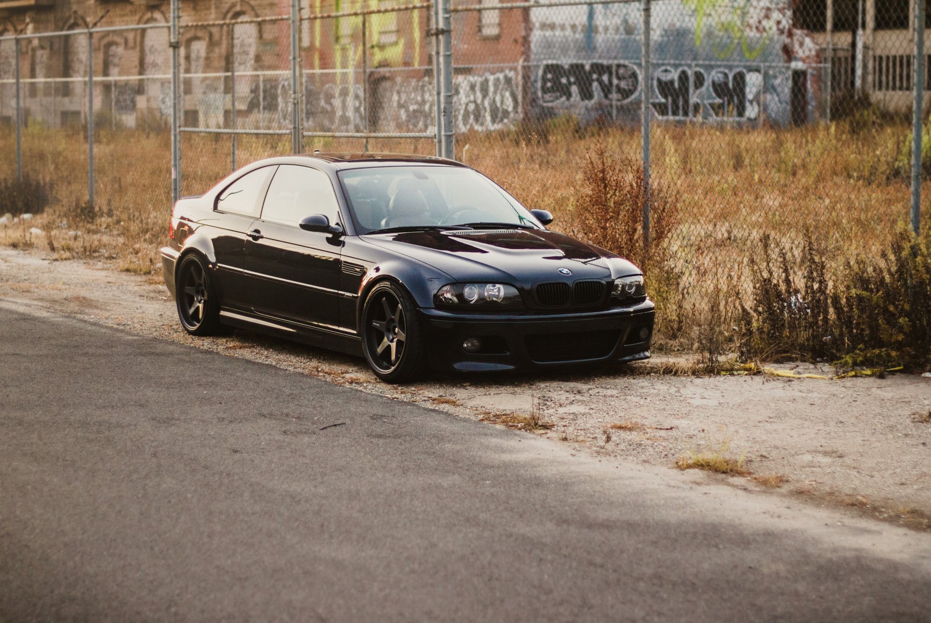 bmw m3 e46 black bmw curb fence building