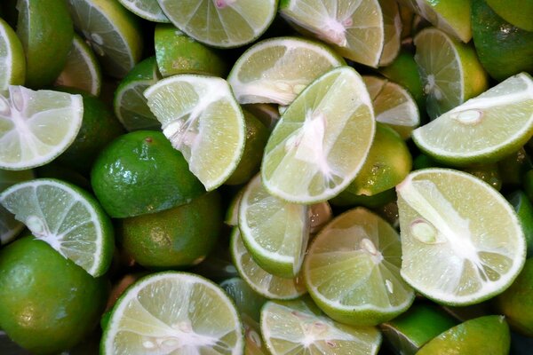 Lime slices. Lime in the cut. Lots of citrus fruits