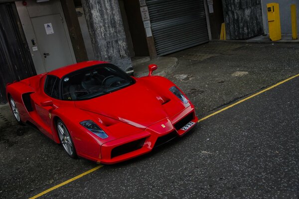 Red Ferrari in the underground parking lot